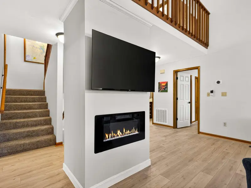 Warm Ambience: The linear gas fireplace adds instant mood and warmth to your evenings.