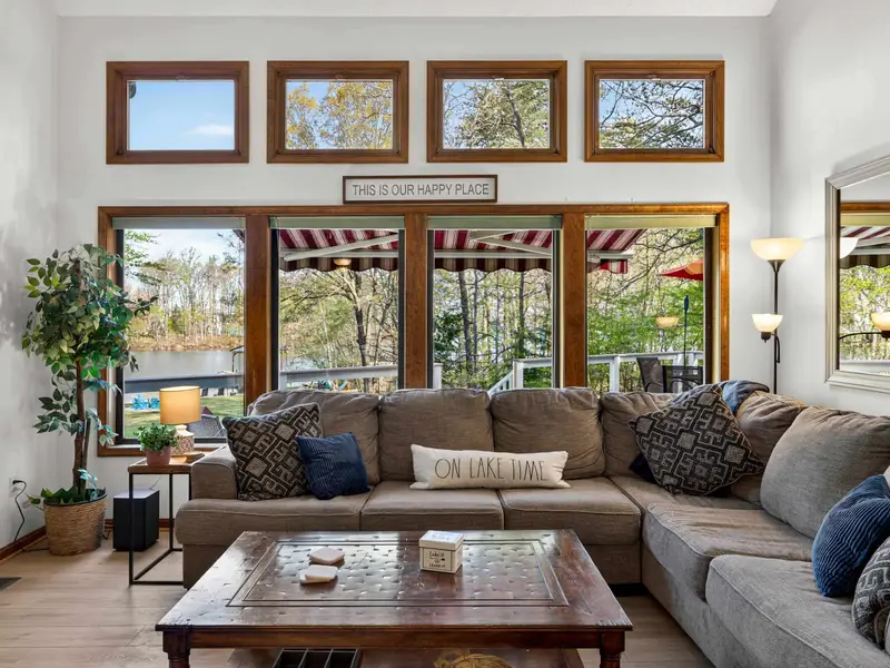 Treehouse Views: Oversized windows frame the lush canopy like living art.