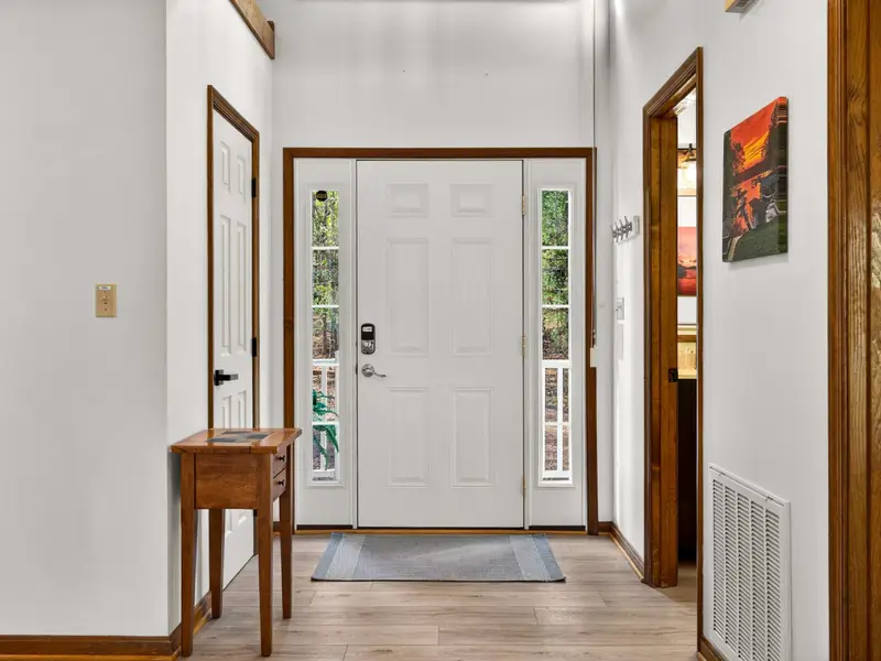 The Welcome Foyer: Step onto beautiful hardwoods that flow throughout the main level.
