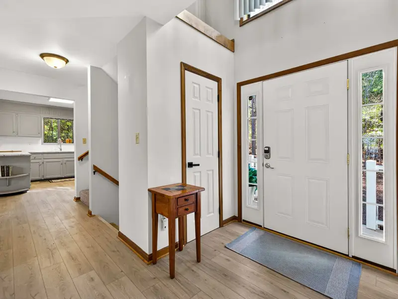Bright Transitions: Natural light spills from the living room into every hallway.