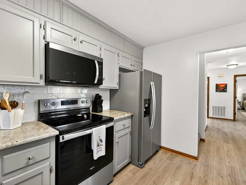 Gourmet Standard: A clean, organized kitchen fully stocked for your arrival.