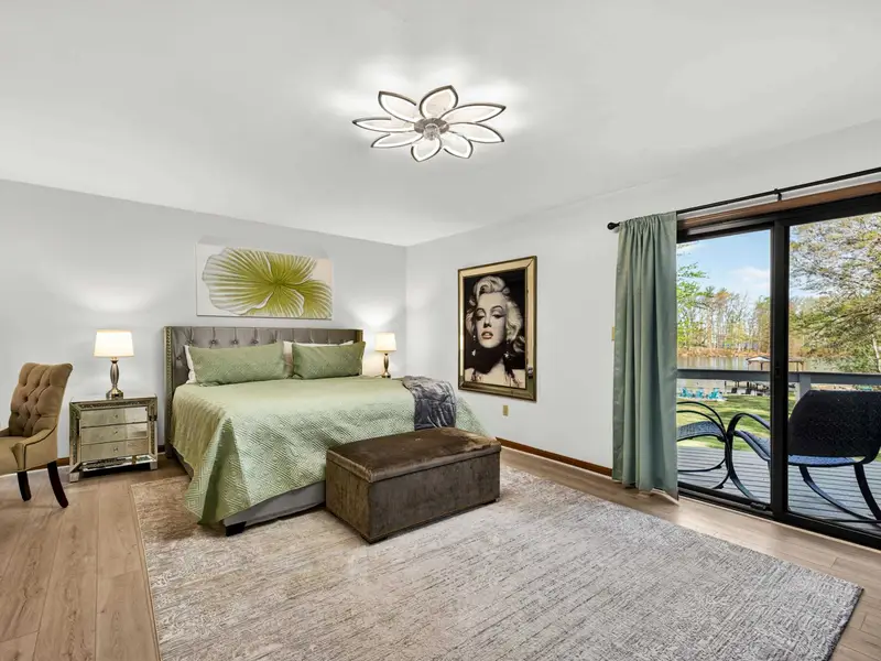 Wake Up to Nature: Floor-to-ceiling windows offer private views of the trees.