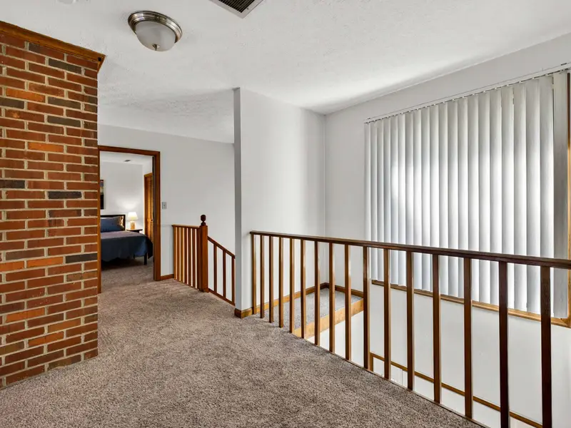 Perspective: Looking down from the railing at the heart of the home.