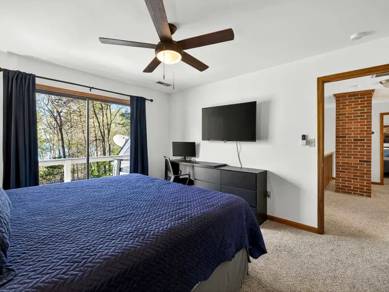 Treetop Terrace: Slide open the doors and feel the lake breeze from your bed.