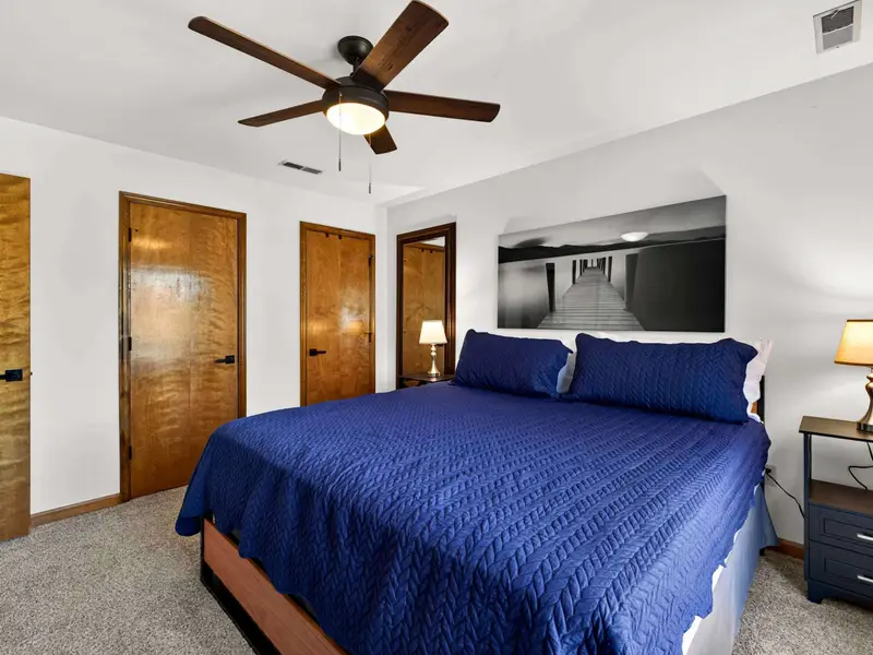 Quiet Comfort: A peaceful, well-appointed room away from the main level hub.