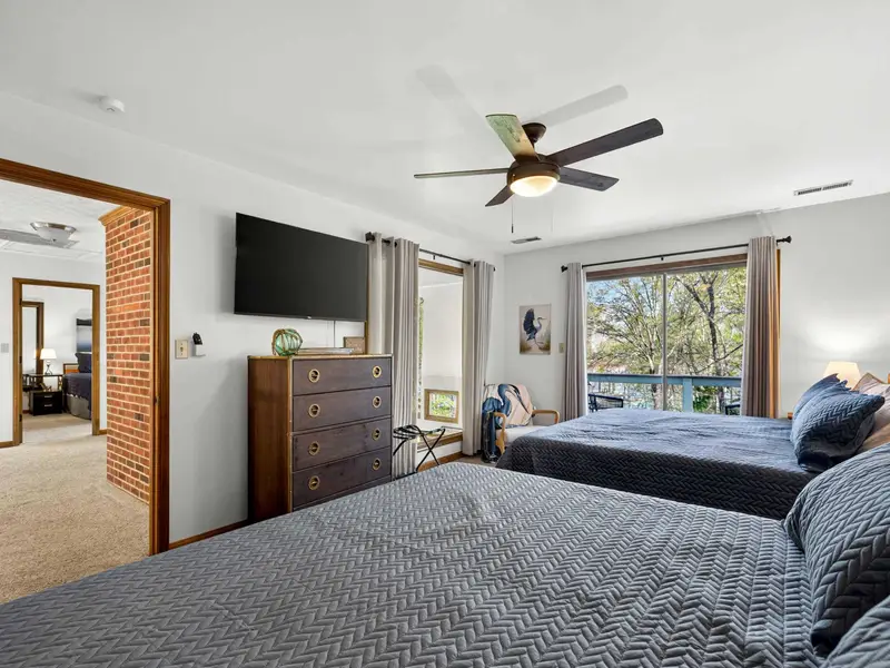 Room for the Crew: Vaulted ceilings make this large guest room feel even bigger.