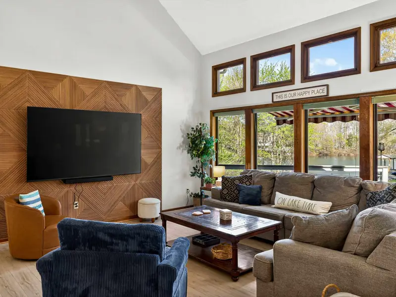 Happy Place: Our living room motto, and we hope it becomes yours too.