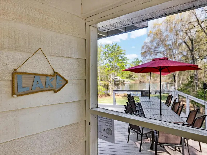 The Sign of a Good Time: Direct access to the screened porch from the main level.
