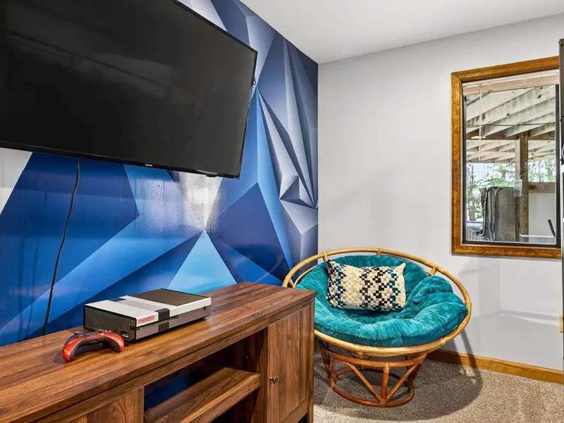 Gamer's Corner: A dedicated TV and seating area just for the bunk room.