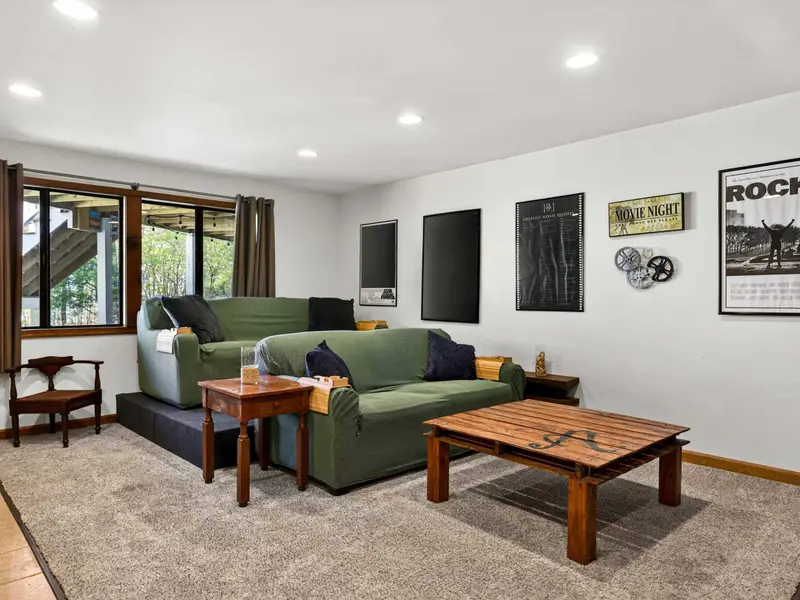 The Family Room: Sink into the green sectional for a cinematic movie night.