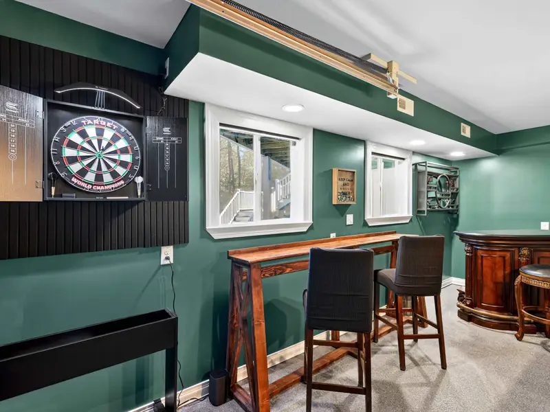 Pub Seating: Grab a stool at the bar and enjoy the basement vibe.