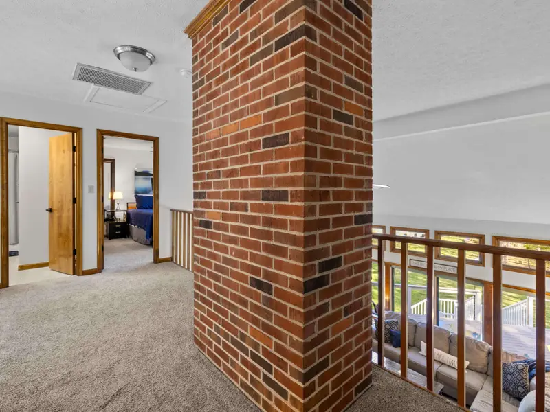 Architectural Interest: The exposed brick chimney adds a touch of historic character.