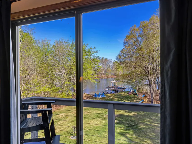 Indoor-Outdoor Fun: The game room opens directly to the lower patio and yard.