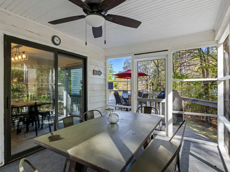 Al Fresco Dining: Seating for six under the ceiling fan for breezy dinners.