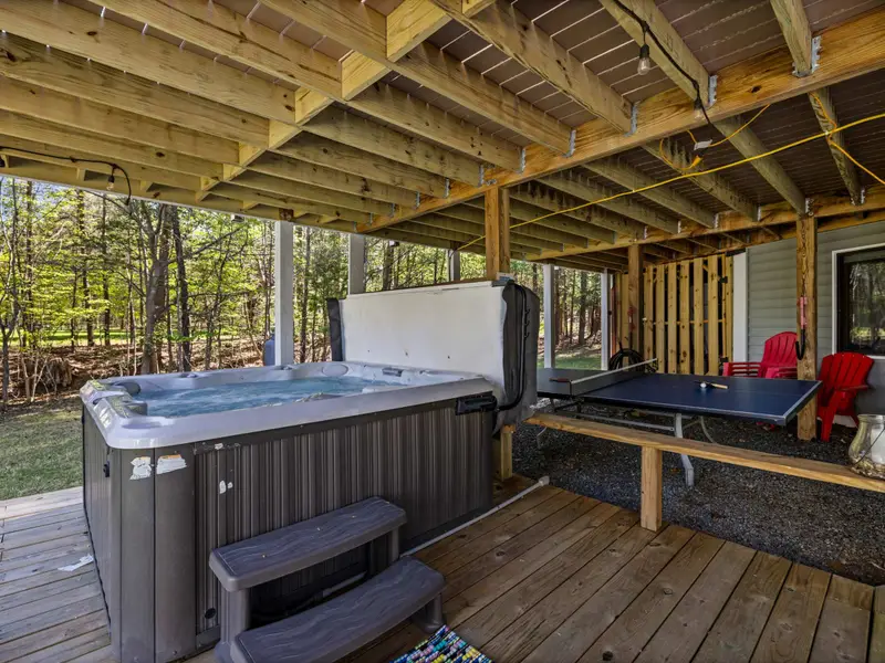 The Hot Tub: Tucked away for privacy under the deck, the ultimate soak.