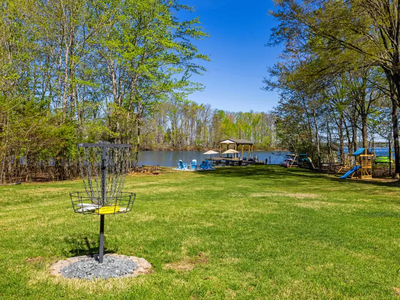 The Scale of the Shore: Looking toward the lake from the edge of the lawn.