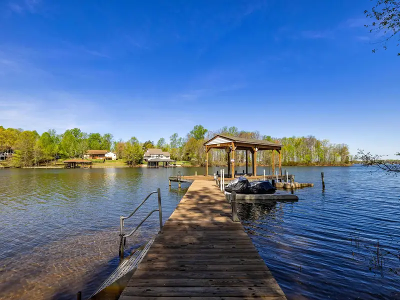 Inside the Boathouse: Boat lift access and storage for all your gear.