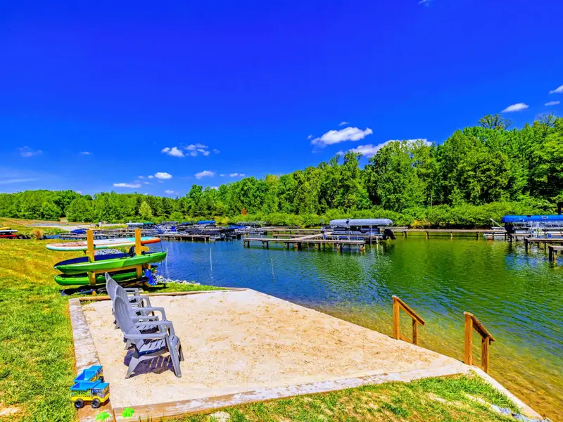 Private Beach - Your own sandy stretch with kayaks and canoes ready to launch, the cove waiting just a few feet away.