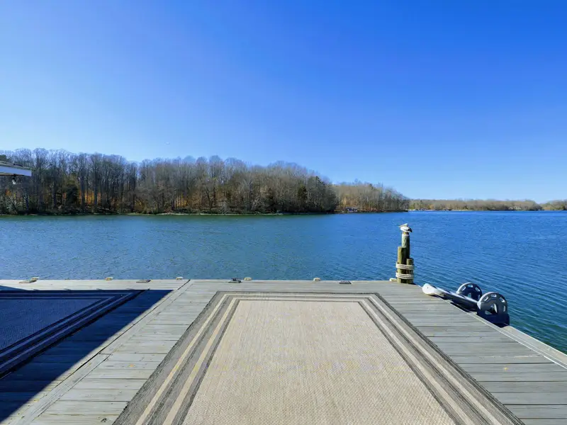 Backyard - The waterfront opens up behind the home, room to spread out and easy access to the lake.