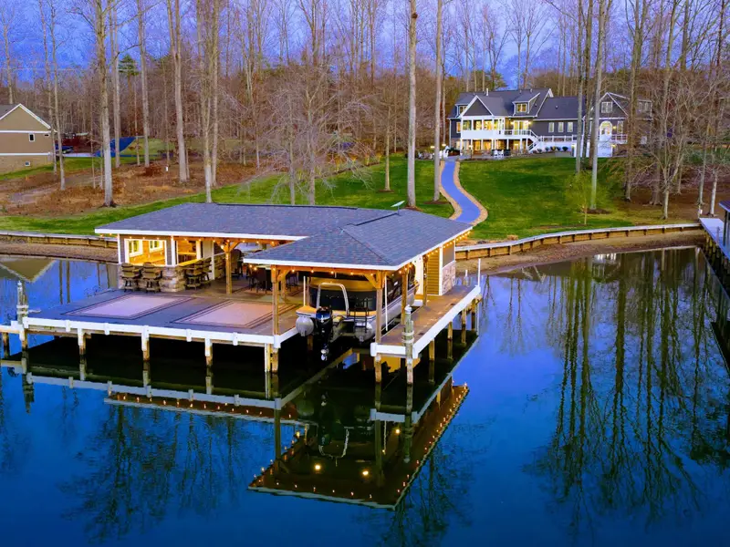 Backyard - The waterfront opens up behind the home, room to spread out and easy access to the lake.