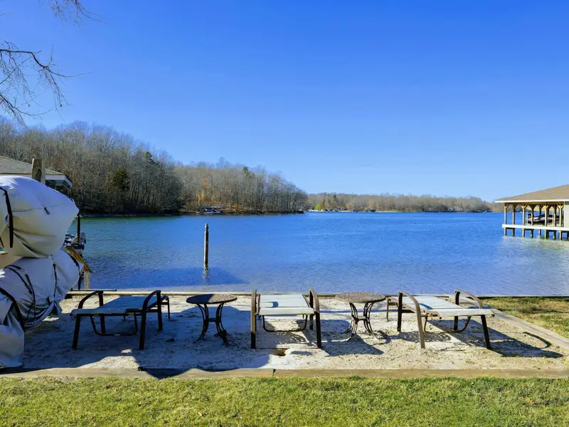 Backyard - The lake takes center stage from this side of the property, a constant view all day.