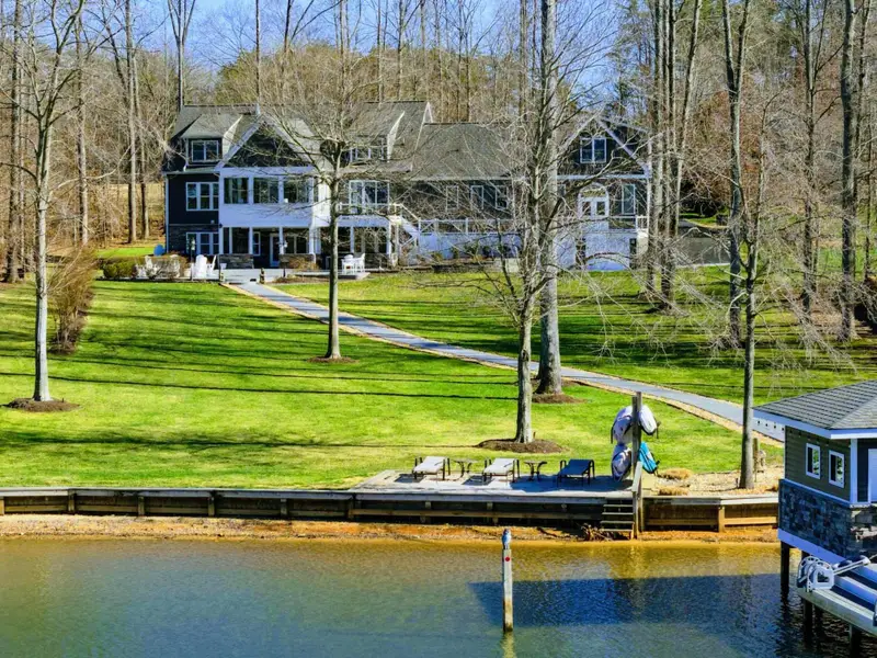 Backyard - The waterfront opens up behind the home, room to spread out and easy access to the lake.