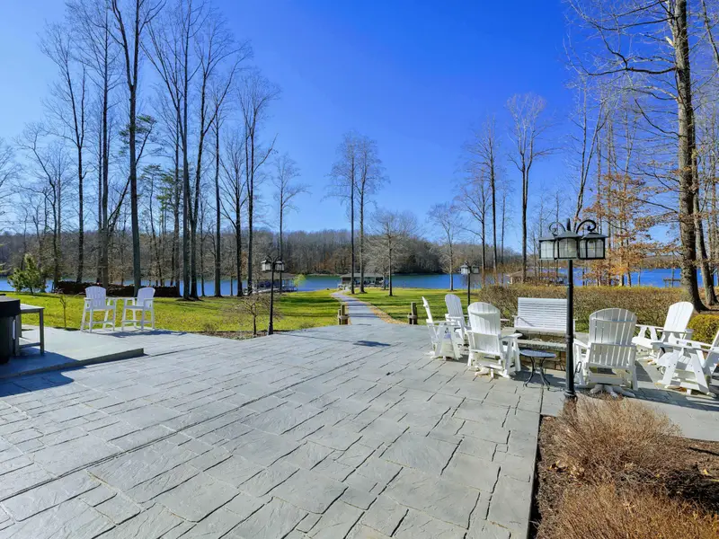 Patio - A waterfront-facing patio with seating arranged for the view, ideal for morning coffee or late conversations.