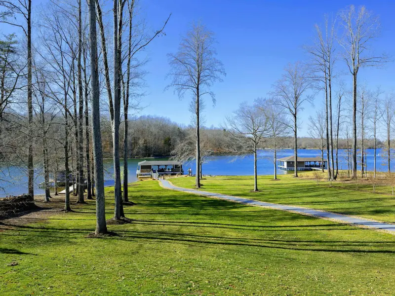 Backyard - The lake takes center stage from this side of the property, a constant view all day.