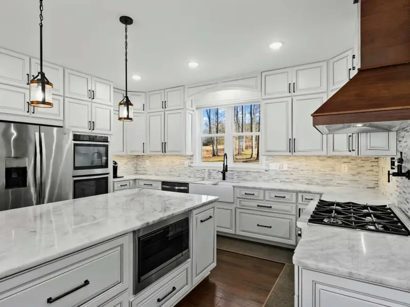 Kitchen - Open to the great room so the chef stays in the conversation while everyone gathers.