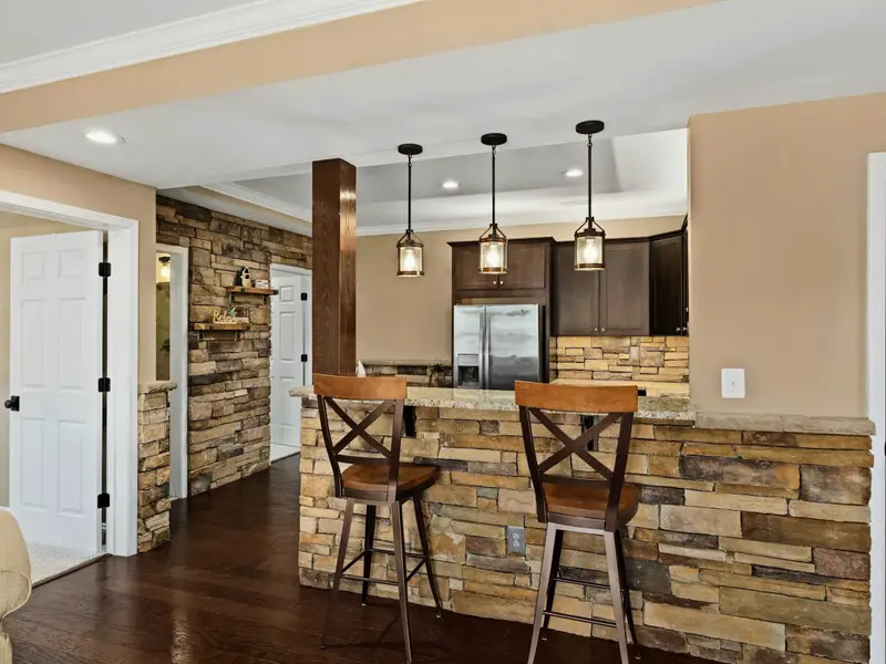 Living Room - Plenty of seating with thoughtful design touches throughout.