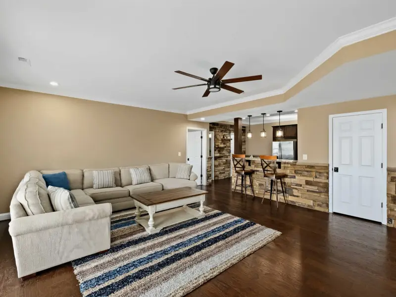 Living Room - Designed for board games, books, or a quieter evening apart from the great room.