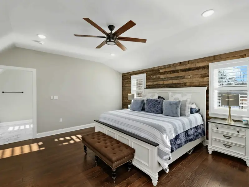 Upper Level Bedroom - Soft linens, attached bath, and quiet upper-level views.