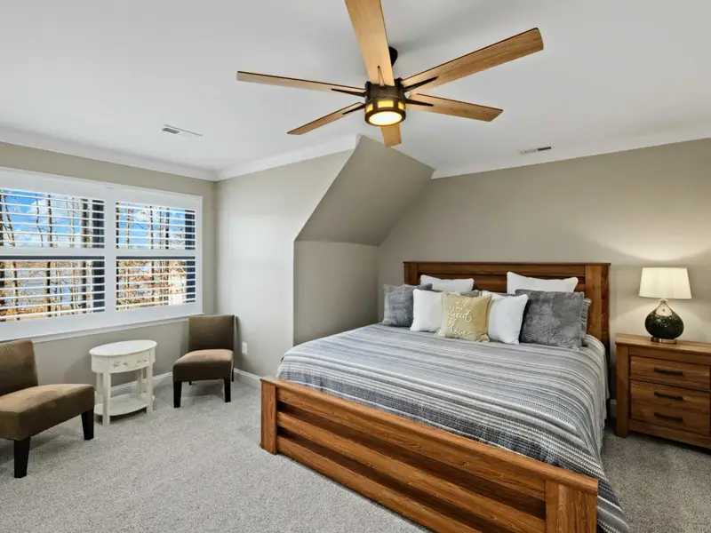 Upper Level Bedroom - Another upper-level suite with private ensuite for added privacy.