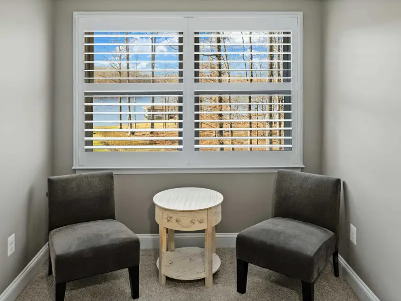 Upper Level Bedroom - Comfortable layout and attached bath, a quiet corner of the upper floor.