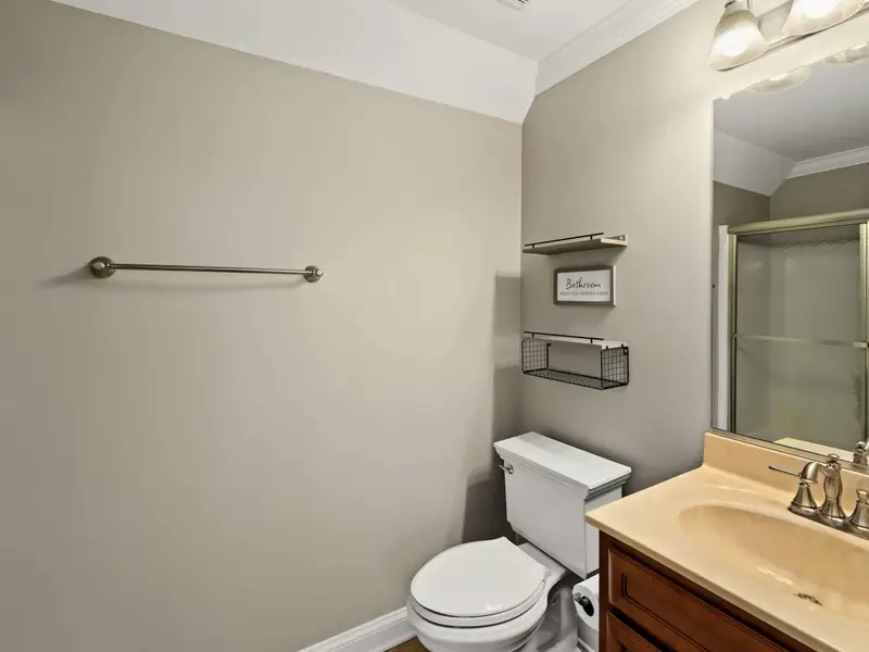 Upper Level Bedroom - Another upper-level suite with private ensuite for added privacy.