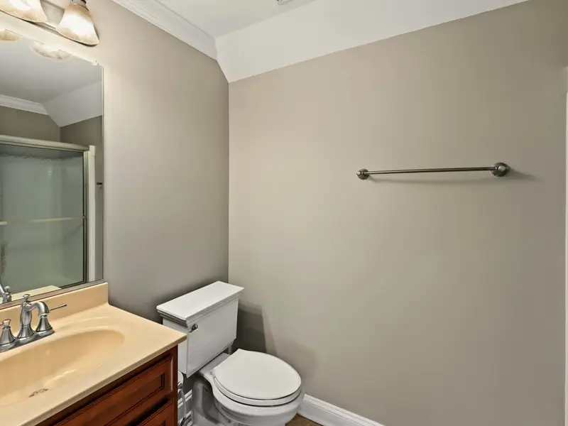 Upper Level Bedroom - Light, airy, and ready for guests with its own ensuite bath.