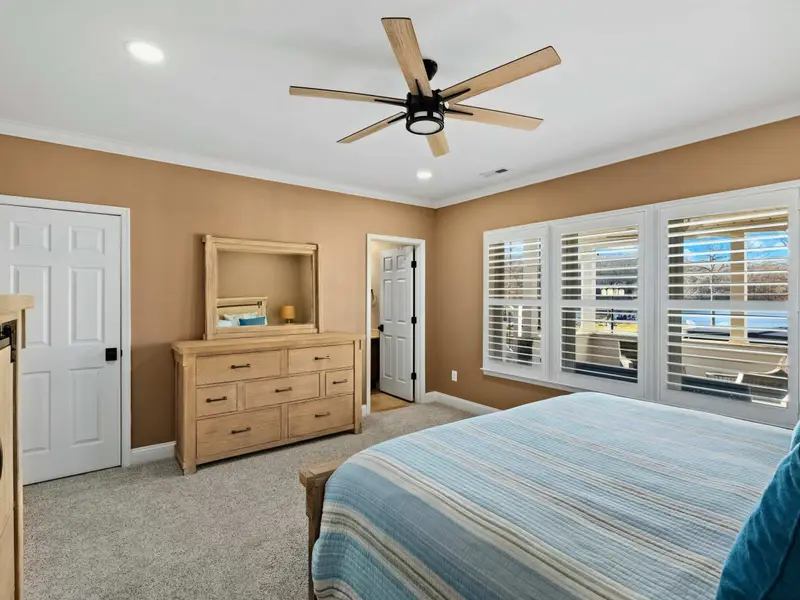 Lower Level Bedroom - Quiet lower-level retreat with its own ensuite, perfect for older guests or teens.
