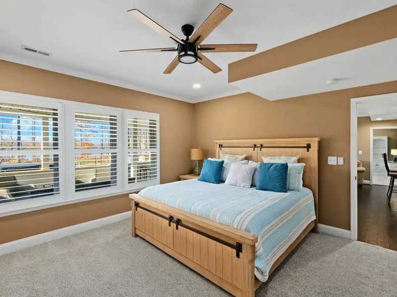 Lower Level Bedroom - Private suite on the walkout level, with attached bath and easy access to the lake.