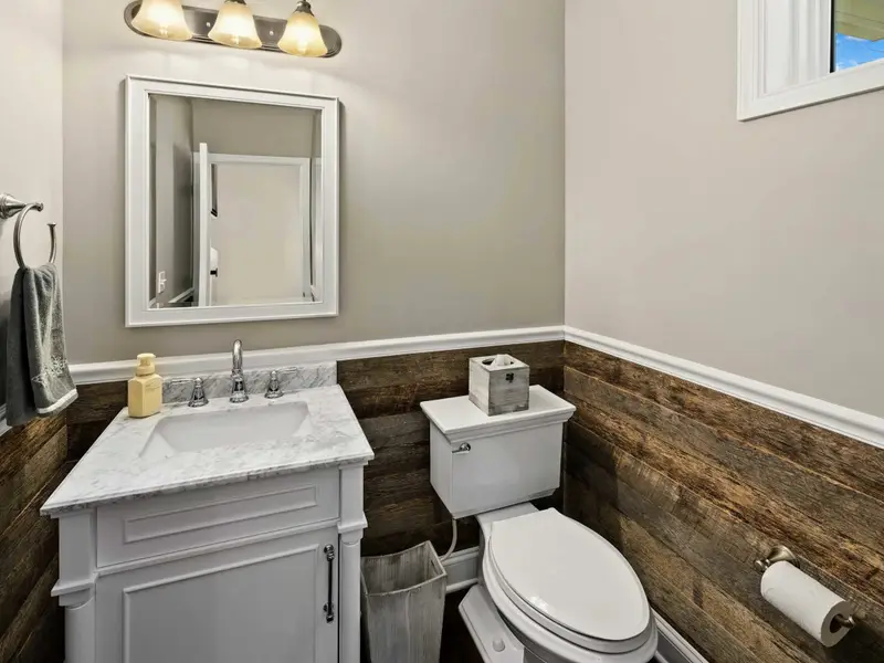 Half Bath - Conveniently located off the main level for guests during the day.