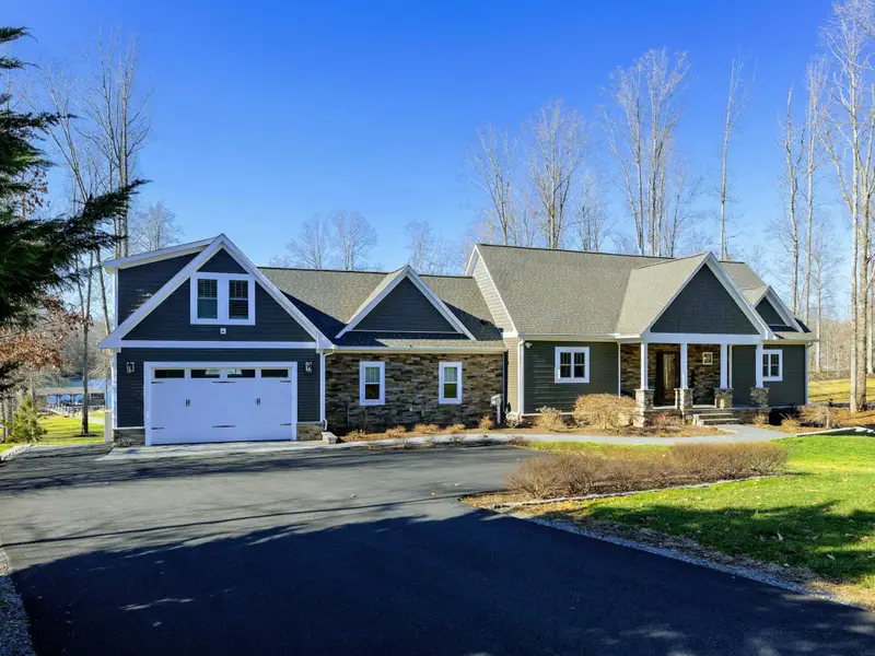 Exterior - Craftsman-style lakefront home tucked at the end of a quiet cul-de-sac in Cuckoo's Nest.