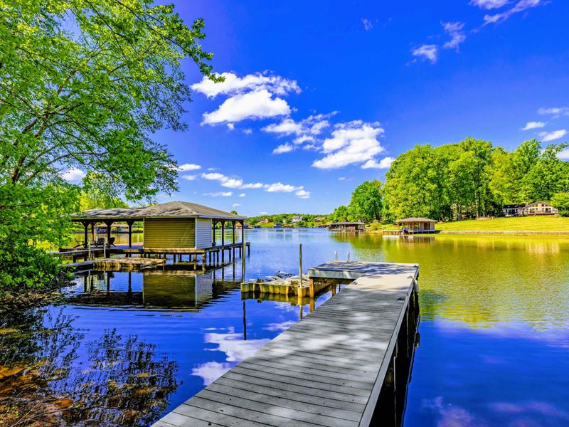 Cove View - The home sits on a peaceful cove with year-round shade from mature trees.