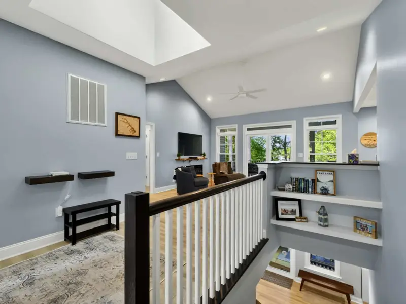 Great Room - 60-inch smart HDTV, electric fireplace, and comfortable seating for the whole crew.