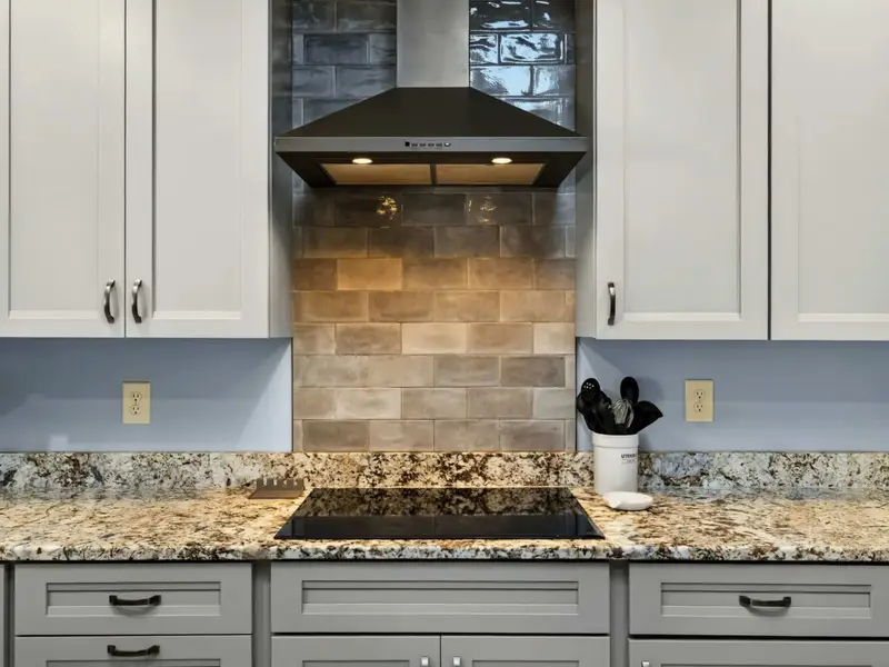 Kitchen - Open to the entry and dining, so no one misses the conversation.