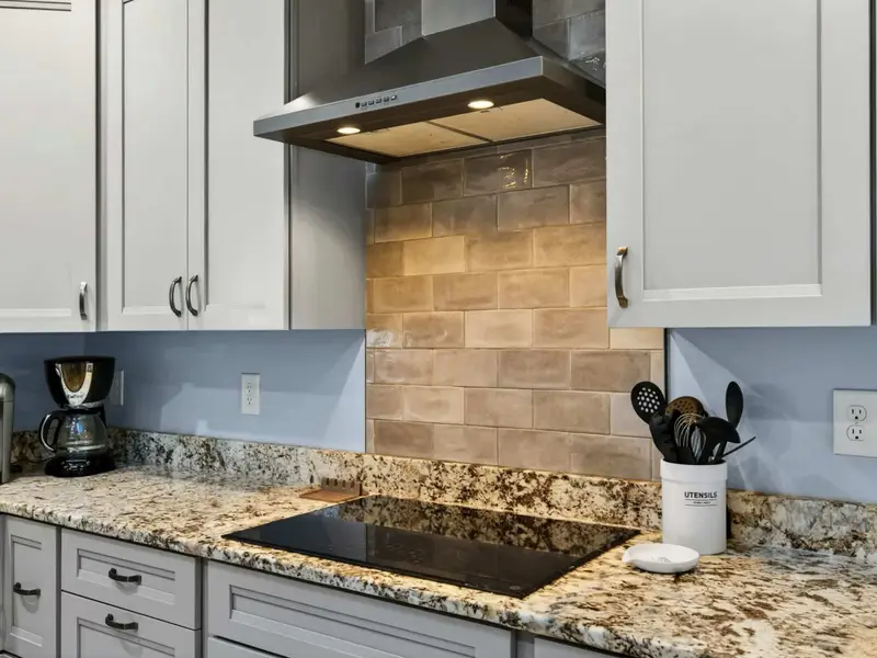 Kitchen - Skylight above brings natural light right over the prep area.