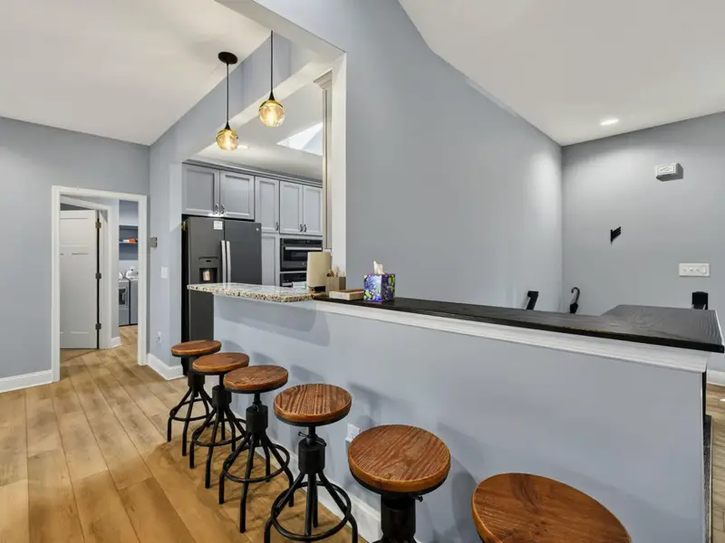 Entry - Bright, airy entry with skylight and a wide foyer.