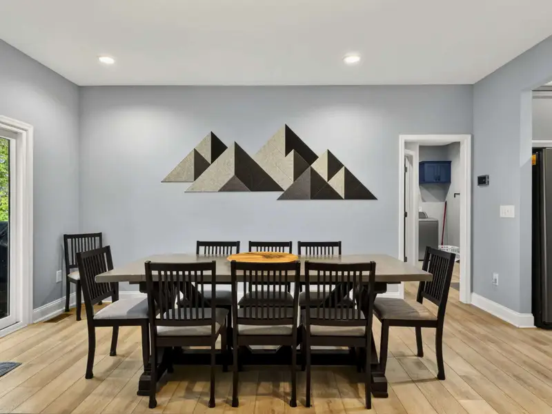 Dining - Easy flow between bar, kitchen, and great room for hosting groups.