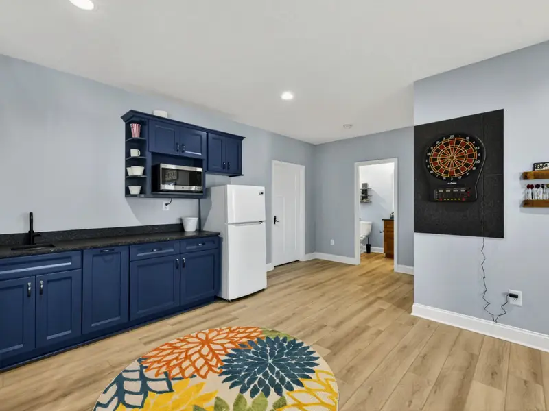 Game Room - Wet bar / kitchenette with mini fridge and microwave for game-night refreshments.