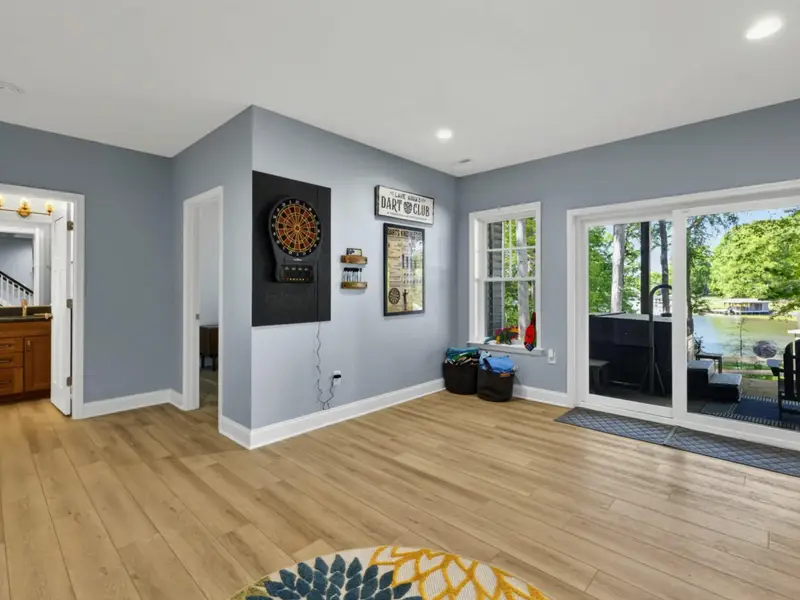 Game Room - Themed dart-club artwork sets the playful tone.