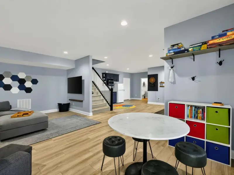 Game Room - Comfortable for a quiet read or a competitive darts night.