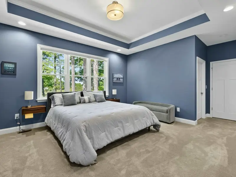 Suite 1 - Main-level king bedroom with sitting area and ensuite bath.